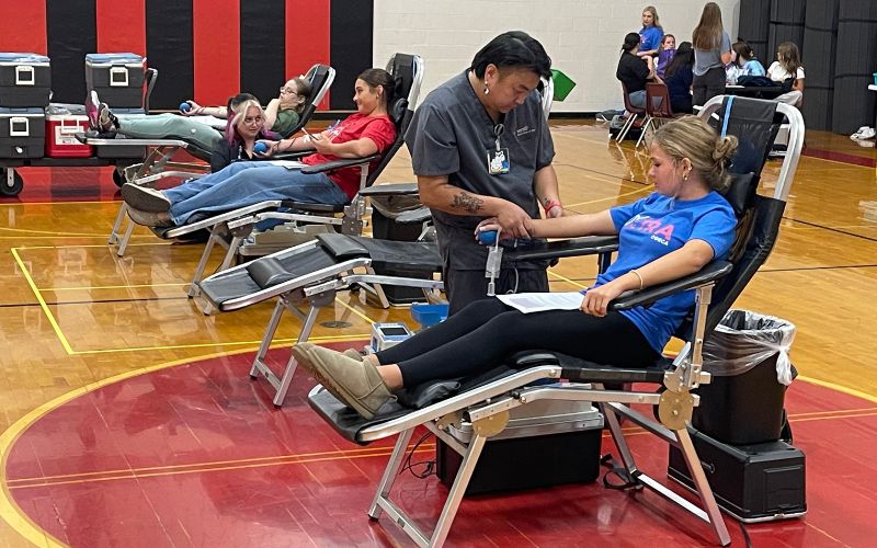 Local students roll up sleeves to donate blood